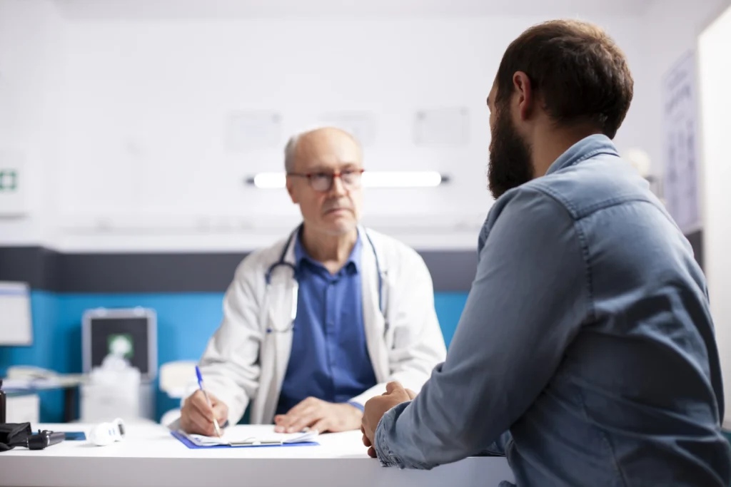 Doctor consulting with a male patient during a testosterone optimization clinic appointment in Florida